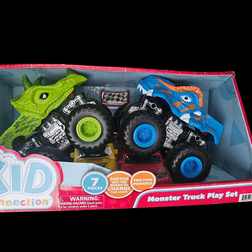 Green and Blue Monster Trucks with Oversized Wheels